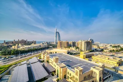 an aerial view of a city with buildings at Luxury Madinat Living 2BR with Sea Views in Dubai