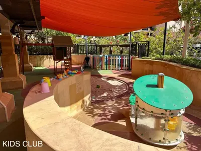 a childrens play area with a table in a playground at Elegant 1BR Full Palm View Apartment at 5 Star Resort in Dubai