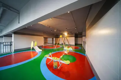 a room with a play area with a playground at Modern Studio, Canal View, Elite Downtown, Dubai - 13AB06 in Dubai