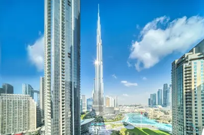 a view of a city skyline with the tallest building at Plush 2BR at Grand Opera Downtown Dubai by Deluxe Holiday Homes in Dubai