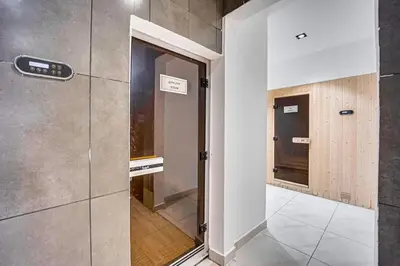 a room with a door to a kitchen with a door at Amazing Luxury Studio in Dubai in Dubai