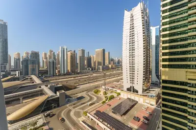 a view of a city with tall buildings at Luxe Living in our Exquisite 1 Bedroom Apartment in Dubai