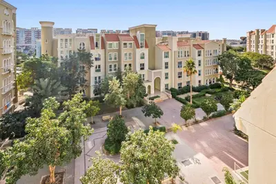 an aerial view of a city with buildings at Luxury 1 Bedroom Apartment in Discovery Gardens in Dubai