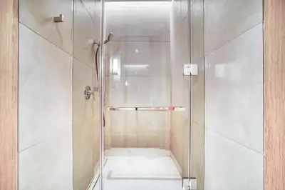 a shower with a glass door in a bathroom at Address JBR Marina View, JBR, Dubai Marina - Mint Stay in Dubai