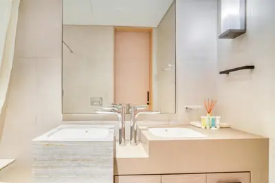 a bathroom with two sinks and a mirror at Address JBR Marina View, JBR, Dubai Marina - Mint Stay in Dubai