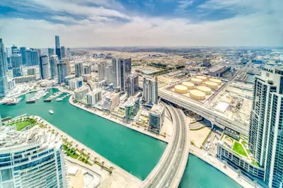 an aerial view of a city with a river and buildings at Address JBR Marina View, JBR, Dubai Marina - Mint Stay in Dubai