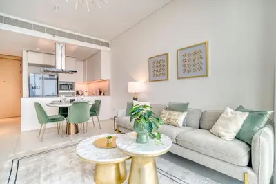 a living room with a couch and a table at Address JBR Marina View, JBR, Dubai Marina - Mint Stay in Dubai