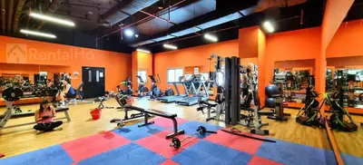 a gym with people working out in the gym at 35% OFF in Top View Studio w/ Balcony in Marina in Dubai