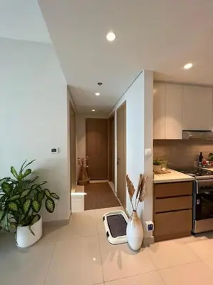 a kitchen with a scale in the middle of a room at Beautiful Flat in Harbor Views in Dubai
