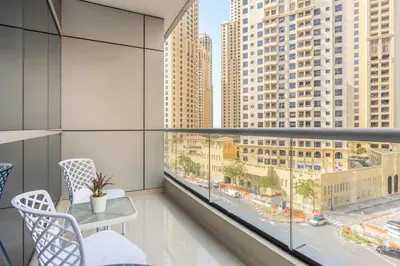 a balcony with a view of a city at GuestReady - Comfort Stay l Close To Marina Mall in Dubai