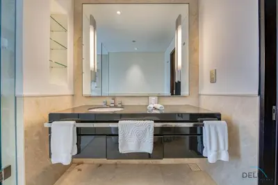 a bathroom with a sink and a mirror at Posh 1BR at The Address Residences Dubai Marina by Deluxe Holiday Homes in Dubai