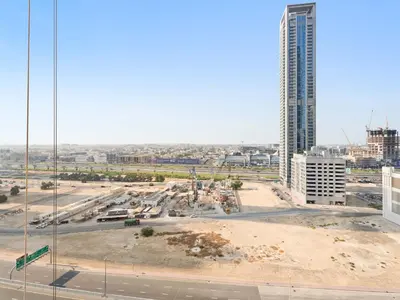 a view of a construction site with a tall building at Sophisticated and Trendy 2BDR In Forte Downtown in Dubai