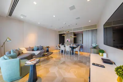 a living room with a couch and a table at *Five Palm* 2bdr Private Beach in Dubai