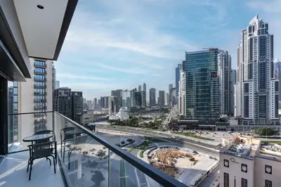 a balcony with a view of a city at Charming 2BR in Burj Crown, Walk to Burj Khalifa - Allsopp&Allsopp in Dubai