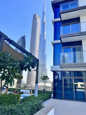 a view of the burj khalifa from a building at Charming 2BR in Burj Crown, Walk to Burj Khalifa - Allsopp&Allsopp in Dubai