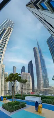 a view of a city skyline with tall buildings at Charming 2BR in Burj Crown, Walk to Burj Khalifa - Allsopp&Allsopp in Dubai