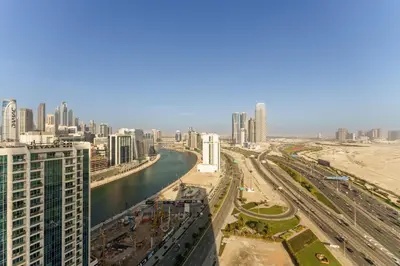 a view of a city with a river and buildings at Our Studio Jewel in Business Bay in Dubai