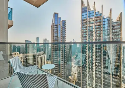 a balcony with a view of a city at Lux 1 BD Apartment, 2 Min walk to Dubai Mall & Burj Khalifa - Act One Tower in Dubai