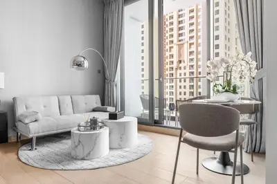 a living room with a couch and a table at Ultra Luxury Dubai Marina I LIV Residence in Dubai