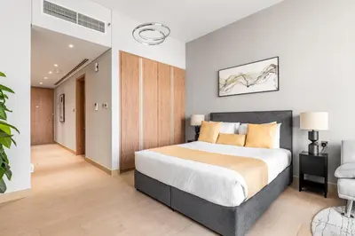 a bedroom with a large bed in a room at Ultra Luxury Dubai Marina I LIV Residence in Dubai