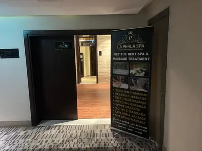 a black door with a sign in front of it at Deluxe Studio Business Bay - Canal View - Gym & Pool in Dubai