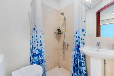 a bathroom with a sink and a shower at 7 Beds / JBR / Sea, JBR Beach and Ain Dubai Views / 3 min walk from JBR Beach / Large Groups and Families / Ideal Vacation Location in Dubai
