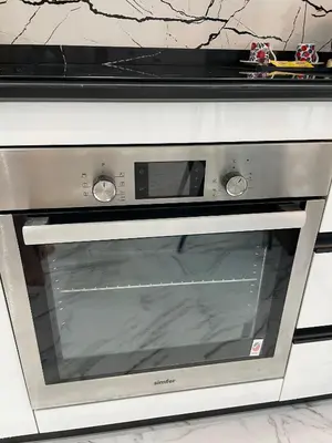 a microwave oven sitting on top of a counter at Stay in heart of Dubai Marina, walk to JBR! #3 in Dubai