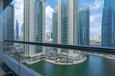 a view of a city with tall buildings and water at GuestReady Holiday Homes - Lux Studio with a View in Dubai