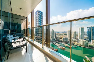 a balcony with a view of the city at SettlerHomes - Sparkle Tower 2 With Marina & Sea View in Dubai