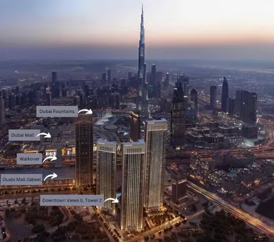 an aerial view of a city with a tall skyscraper at 2BR Apt next to DubaiMall, pool view of Burj Khalifa - Downtown Views ll in Dubai