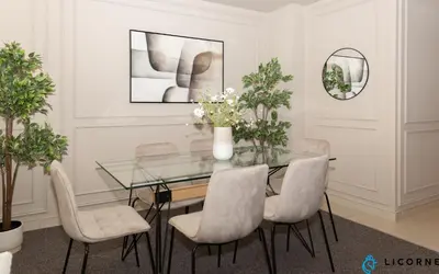 a dining room with a glass table and chairs at Prime Spacious 2 BR Apt, Burj Khalifa & Canal View - Scala Tower in Dubai