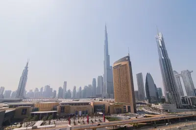 a view of a city with tall buildings at Elite Escape Holiday Home - 2 BHK Getaway with Burj Khalifa View and Dubai Mall Access - 1504 in Dubai