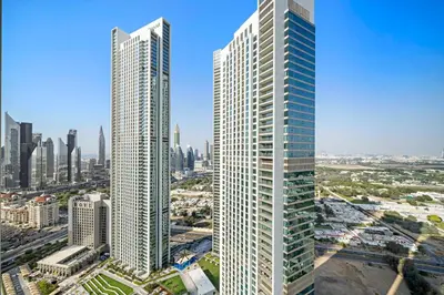 two tall skyscrapers in a city with at Silkhaus Heart of Downtown High Floor with View in Dubai