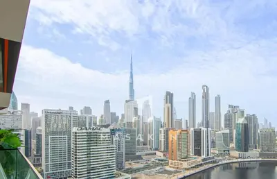 a view of a large city from a building at Stylish 1br Business Bay W Burj Views in Dubai
