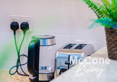 a toaster sitting on top of a counter at Classic 1 Bed Suite in Burj Vista Tower, Downtown in Dubai