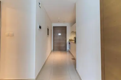a hallway of a house with white walls at HAVN - Studio Unit in Claren Tower, Downtown Dubai in Dubai