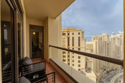 a balcony with a view of a city skyline at Beautiful 2 Bedroom Retreat in the Heart of JBR in Dubai
