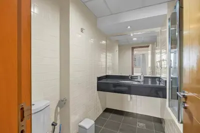 a bathroom with a sink and a toilet at Modern living nestled with 1BR_Silicon Oasis Dubai in Dubai