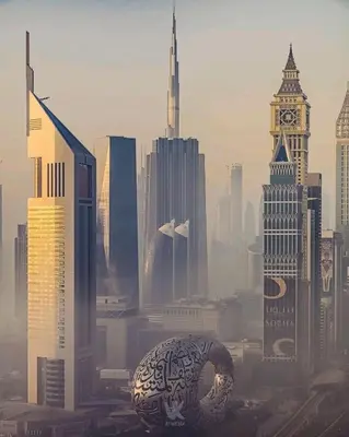 a view of a city with a clock tower at Private Studio Burj Khalifa Area -BEST PRICE in Dubai