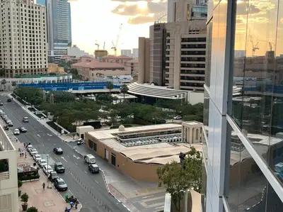 a view of a city with cars on a street at 1 BR Flat, Luxury amenities, Near JBR Beach & Club with FREE Parking in JBR in Dubai