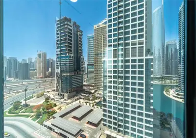 a view of a city with many tall buildings at HAVN - Studio Apartment in JLT, with Lake Views in Dubai
