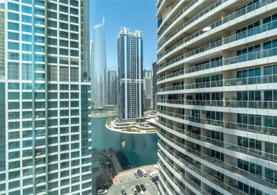 an aerial view of a city with tall buildings at HAVN - Studio Apartment in JLT, with Lake Views in Dubai