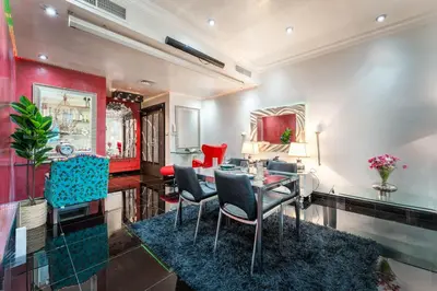 a dining room with a table and chairs at 2 BR Marina View in Marina Heights By PK Holidays in Dubai