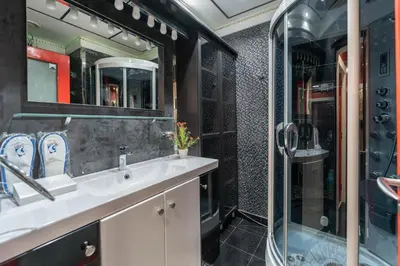 a bathroom with a sink and a shower at 2 BR Marina View in Marina Heights By PK Holidays in Dubai