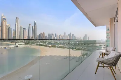 a balcony with a view of the city at Luxury beach house with mesmerizing skyline view in Dubai