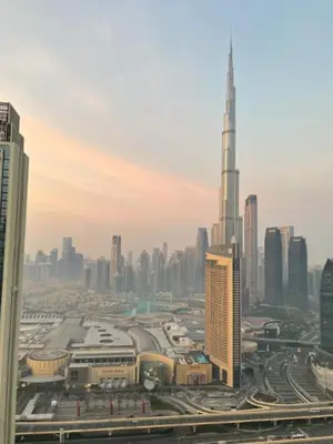 a view of a large city with a tall building at Burj Khalifa view Lux 3 bedroom by Tanami Holiday Homes in Dubai