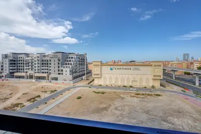 a view from a window of a city with buildings at Mira Holiday Homes -Newly 2 bedroom close to metro. in Dubai