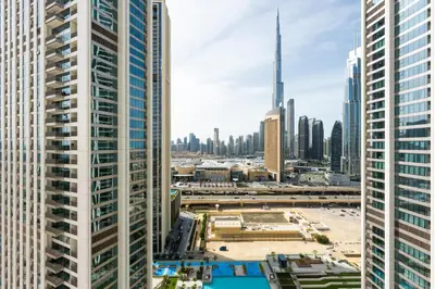 an aerial view of a city with tall buildings at Stunning 2 Bedroom Apartment with Burj Views by Zen Stays - Walking Distance to Dubai Mall in Dubai