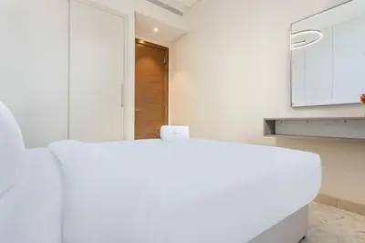 a kitchen with a white counter top in a room at STAY BY LATINEM Luxury 1BR Holiday Home CVR A2504 near Burj Khalifa in Dubai
