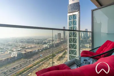 a view of a city from the top of a skyscraper at Oraya - Paramount Midtown Luxurious 2BR with Sea View in Dubai